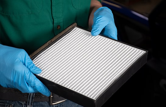 New cabin air filter in the housing tray