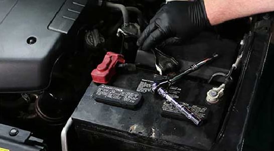 Step 4: Loosen the Battery Hold-Down