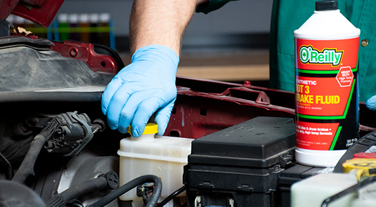 Replacing cap on master cylinder with O'Reilly brake fluid nearby