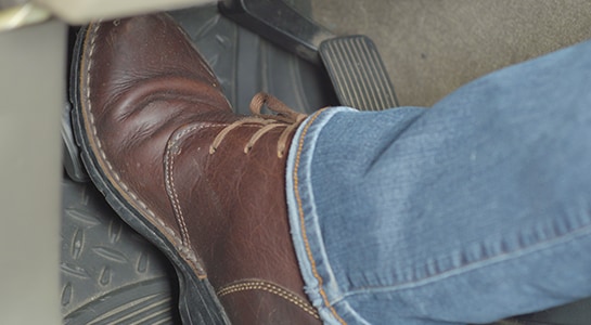 Pushing the brake pedel with slow, steady preassure