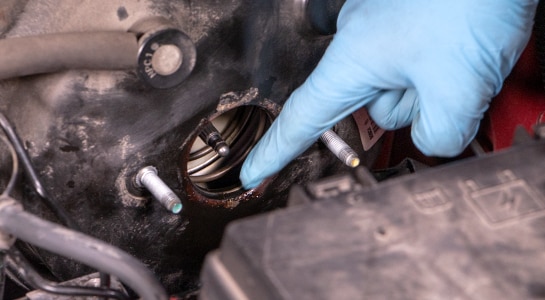 finger pointing out seal at end of master cylinder