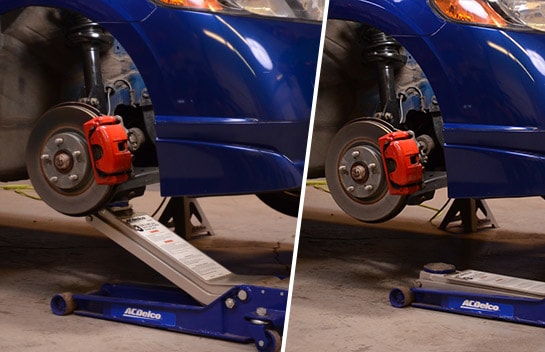 Civic’s front end raise by a jack stand and a jack in the frame