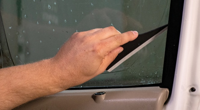 Using a tool to press down the liner