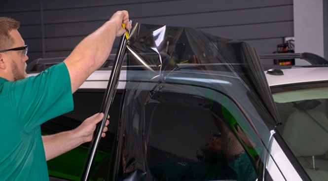 Using a razor blade to cut the liner to size