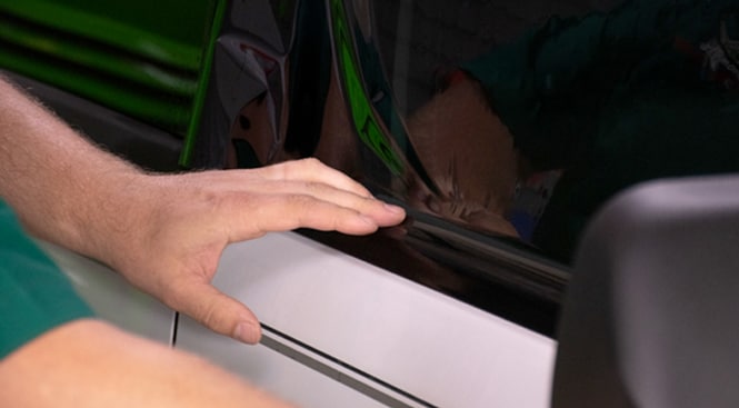 Position the film below the top of the inside gasket. 