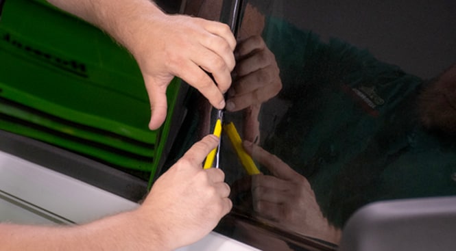 Cutting the window liner to size.