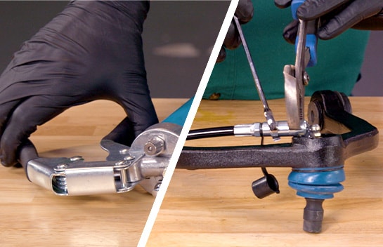 The handle is pumped and the coupler head is tightened with wrenches.