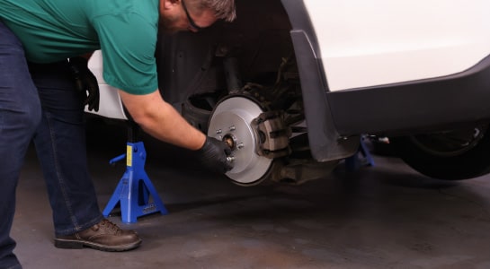 The lug nut holding the rotor is removed.