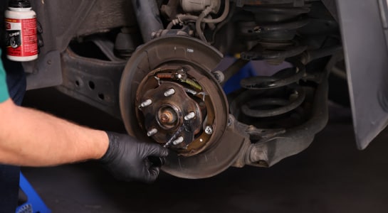 Fresh silicone grease is applied to the hub.