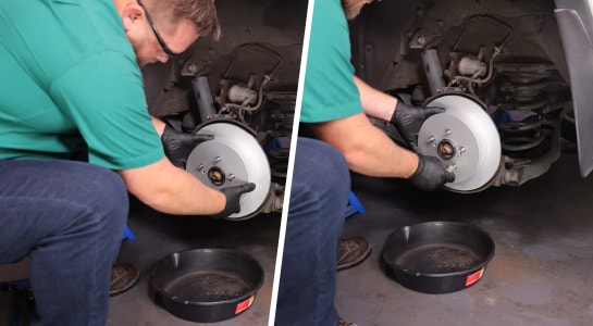 A new rotor is installed and held in place with lug nut.