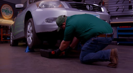Professional Parts Person preparing the vehicle