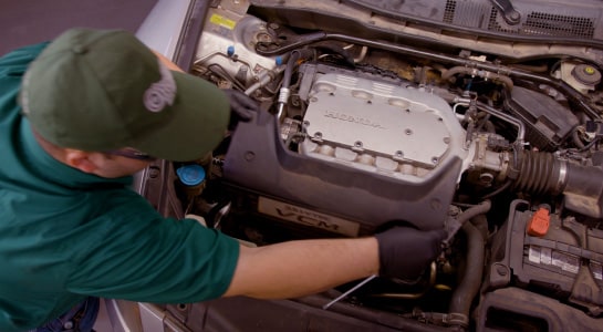 Professional Parts Person locating the Power Steering Pump