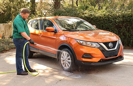 Rinse tires with hose