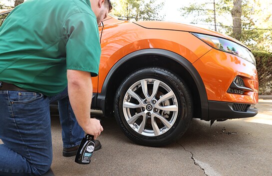 Applying Pro X One Tire Shine