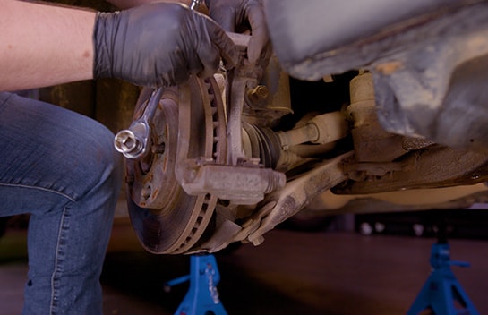 Step 5: Remove the Caliper Bracket