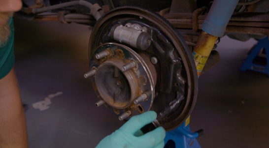 Step 12 Apply Grease to the Backing Plate