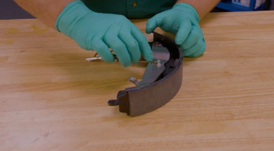 Use your new C-clips to secure parking brake components.