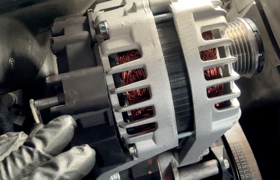 Reinstall the positive cable and nut.