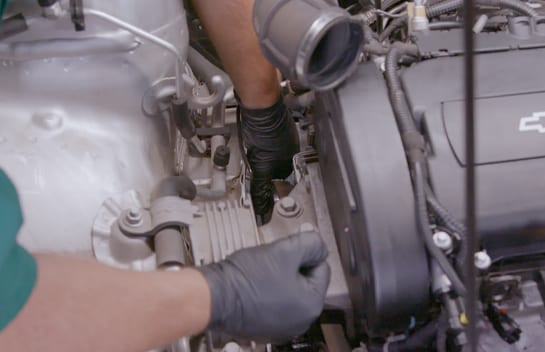 Rotate the tensioner and reinstall the belt.