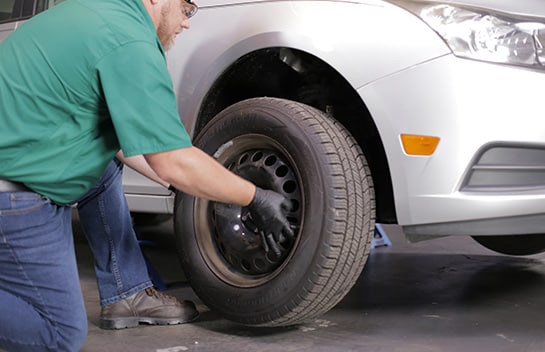 Once the front end is lifted and supported, remove the front wheels.