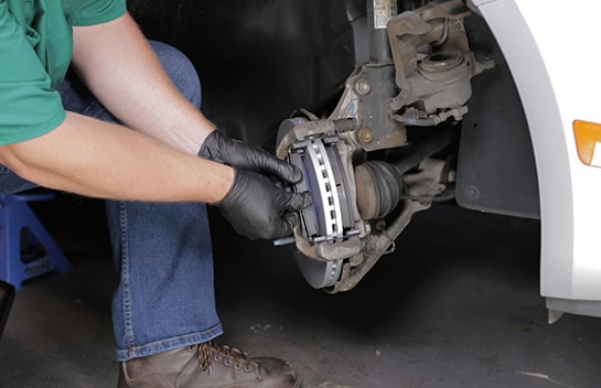 Install the new pads in the caliper bracket.