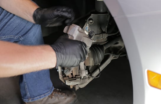 Remove the caliper from the rotor.