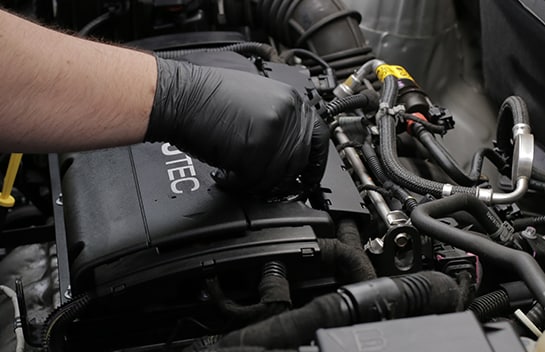 Put the fill cap back in place and run the engine till it’s warm, then check for leaks.