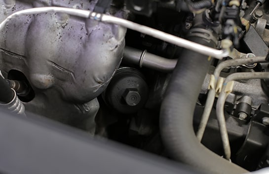 You’ll need a 24mm socket to loosen the filter cartridge cap.