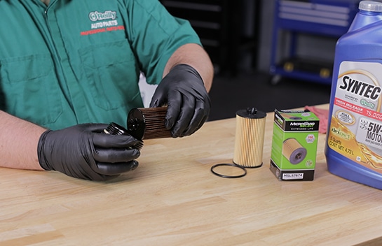 Remove the old filter from the cap.