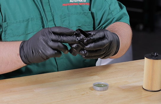 Lubricate the new o-ring with fresh oil.