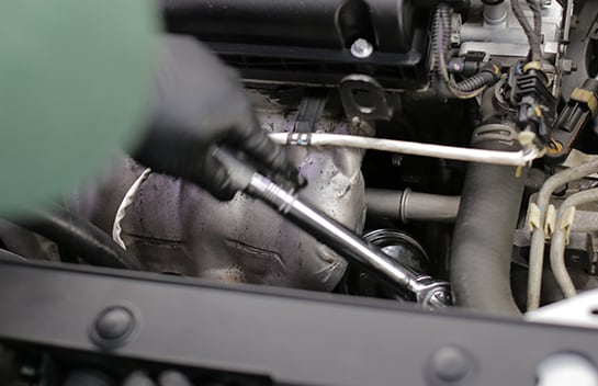 Torque the cap to 18 foot-pounds.