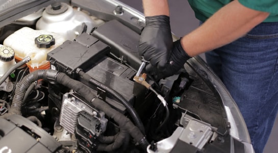 Use a 10mm deep socket to detach the negative battery cable.