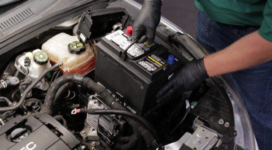 Set your new battery in the tray.