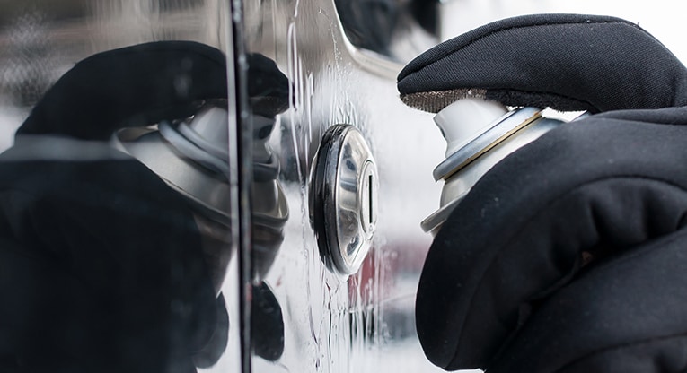 Using a De-Icer on a car door lock