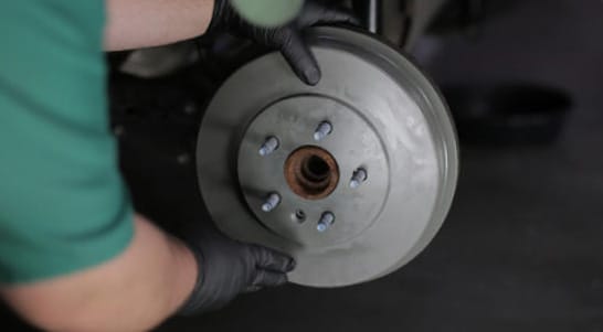 Adjust the star wheel until mild drag is achieved.