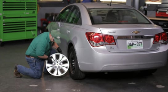 Torque the lug nuts in a star pattern to 100 foot-pounds, and reinstall the wheel covers. 