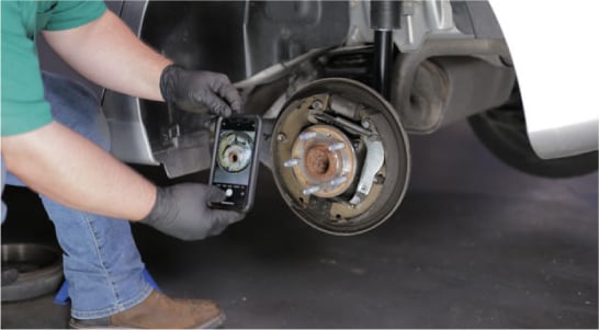 Snap a photo of the drum brake assembly to reference when it’s time to reassemble everything.