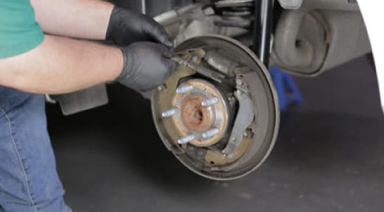 Remove the adjuster assembly.