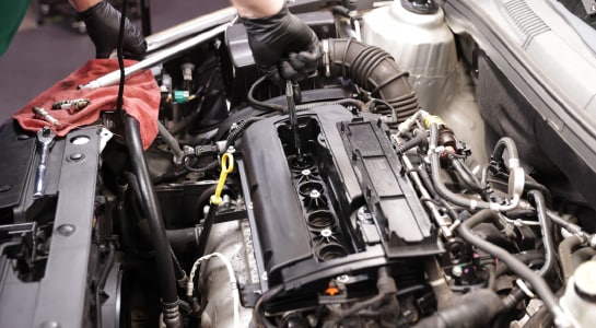 Reinstall your spark plugs and other components.