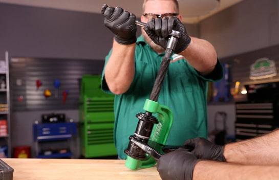 Press the new ball joint into place with your 7/8” or 22mm socket and ratchet.