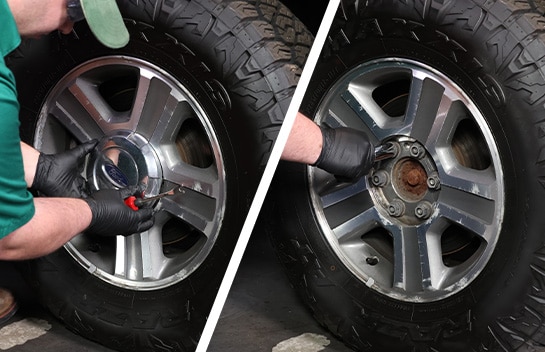 Auto parts professional loosening the front wheel lug nuts on a Ford F-150