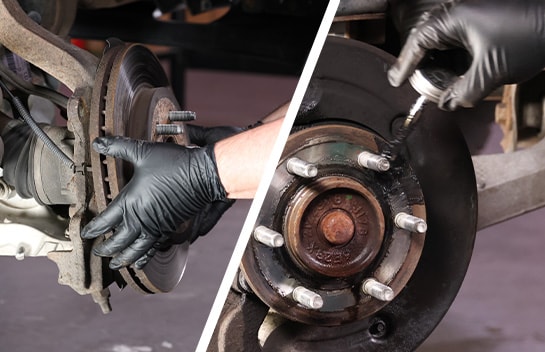 Auto parts professional removing a Ford F-150 rotor