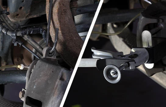 Auto parts professional compressing caliper pistons on a Ford F-150