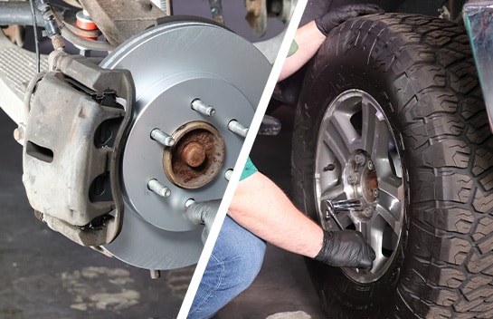 Auto parts professional reinstalling a front wheel on a Ford F-150
