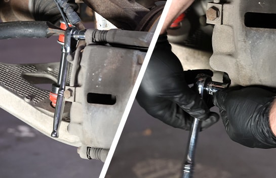 Auto parts professional removing caliper mounting bolts on a Ford F-150