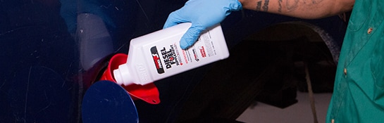 Putting fuel additive into vehicle 