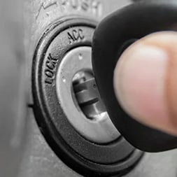 car key going into the ignition 