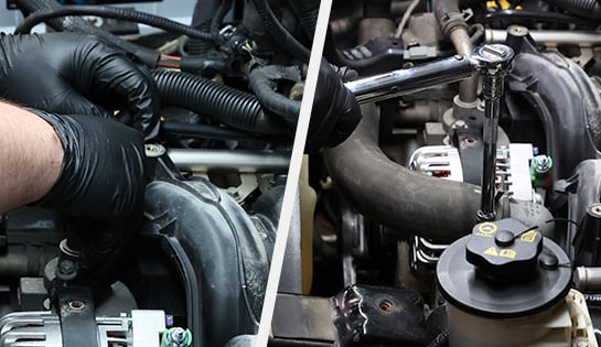 Auto Parts Professional reinstalling the alternator bracket on a Ford F-150